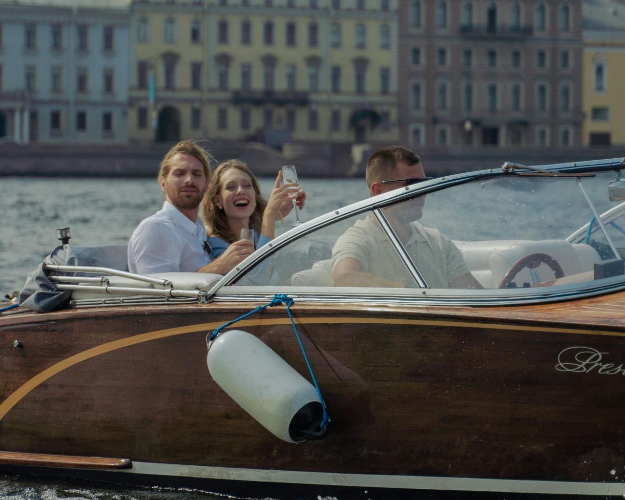 People Riding a Speedboat on Sea